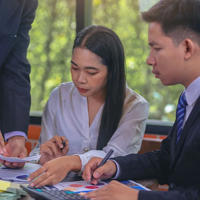 businesspeople having a discussion about assets